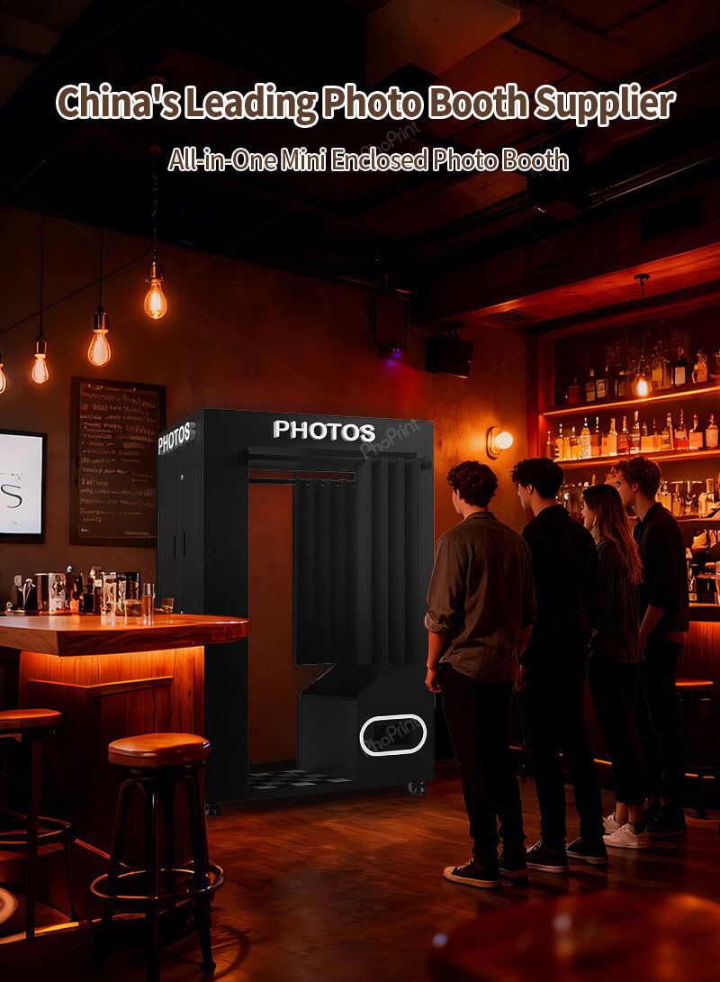 A sleek black mini photo booth in a commercial setting