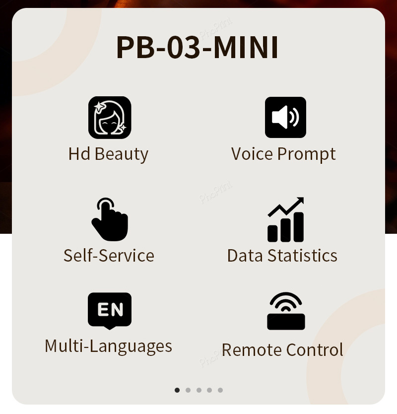 An enclosed photo booth with a black exterior at a corporate event