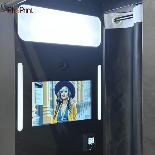 An enclosed booth with a built-in payment kiosk