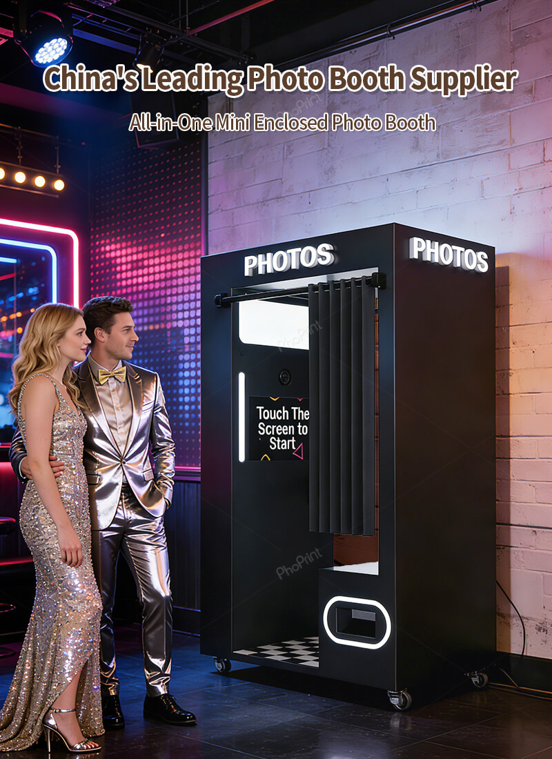 A sleek black mini photo booth in a commercial setting