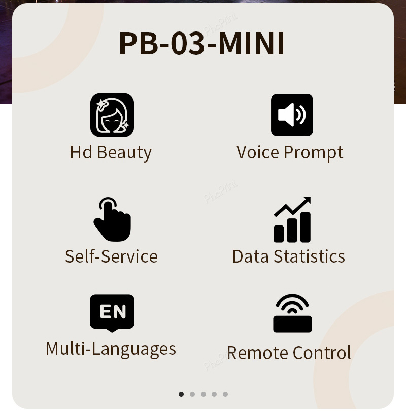 An enclosed photo booth with a black exterior at a corporate event